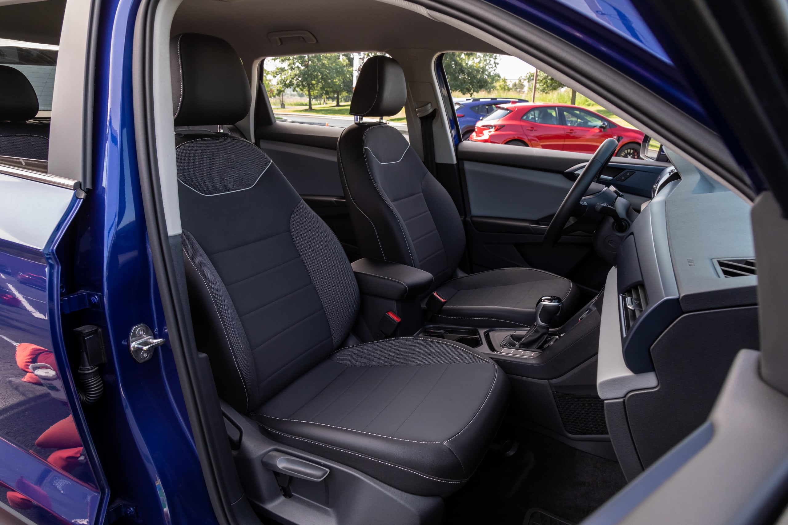 volkswagen taos 1 5t se 2023 19 interior front row seat jpg? i=AA